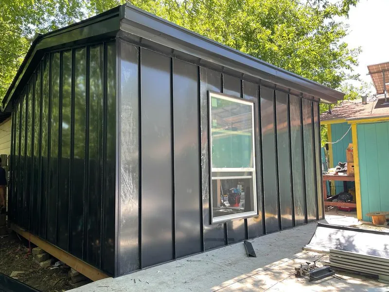 Black standing seam metal wall panels for Roof Inspection in Mount Morris