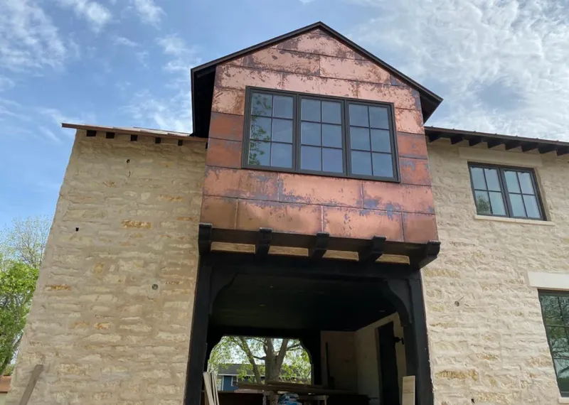 Copper metal panel facade on a stone building for Metal Roof Coating in Mount Morris