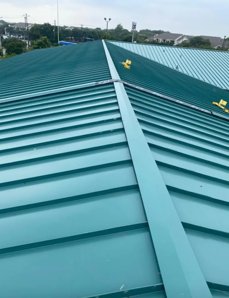 Green commercial metal roof ridge and valley for Metal Roof Repair in Mount Morris