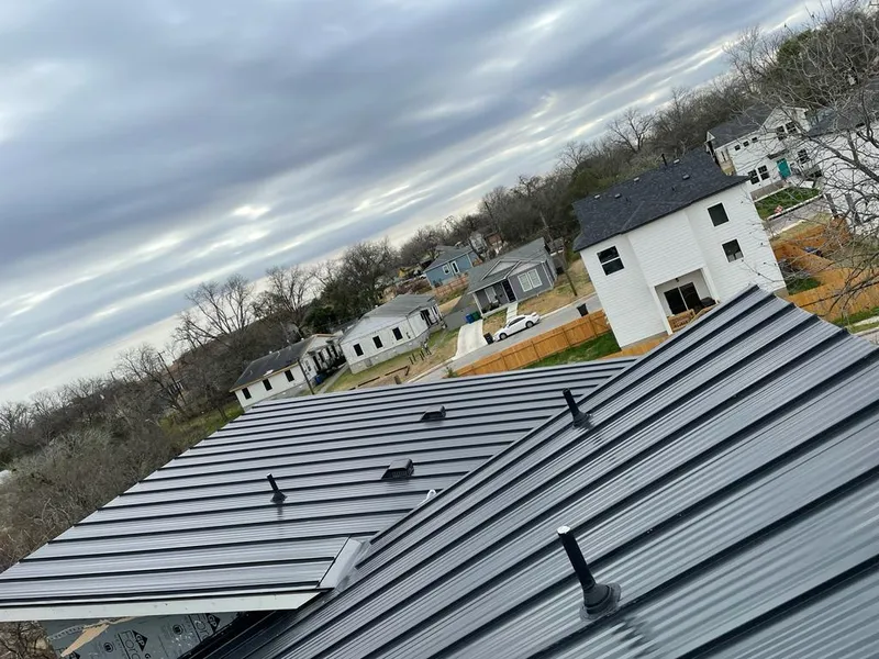 Standing seam metal roof panels with vents for Skylight Repair in Mount Morris